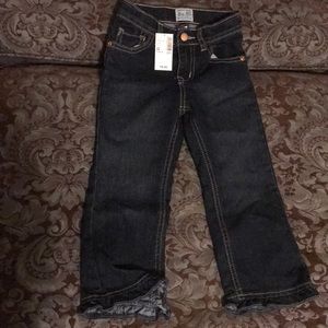 Dark denim ruffle jeans